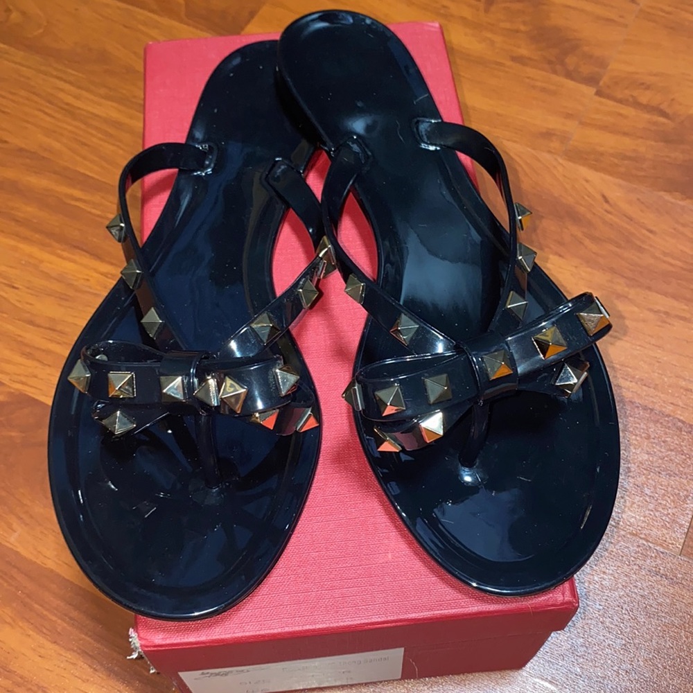 Brand new pvc bow studed sandals in black. Size 9